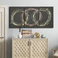 Three-panel canvas wall art featuring geometric abstract wave tangents, displayed above a cabinet in an entryway.