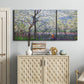 Three-panel canvas wall art featuring fresh spring countryside landscape, displayed above a cabinet in an entryway.