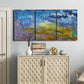 Three-panel canvas wall art featuring expressive abstract with layered color, displayed above a cabinet in an entryway.