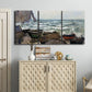 Three-panel canvas wall art featuring rough coastal seas under storm clouds, displayed above a cabinet in an entryway.