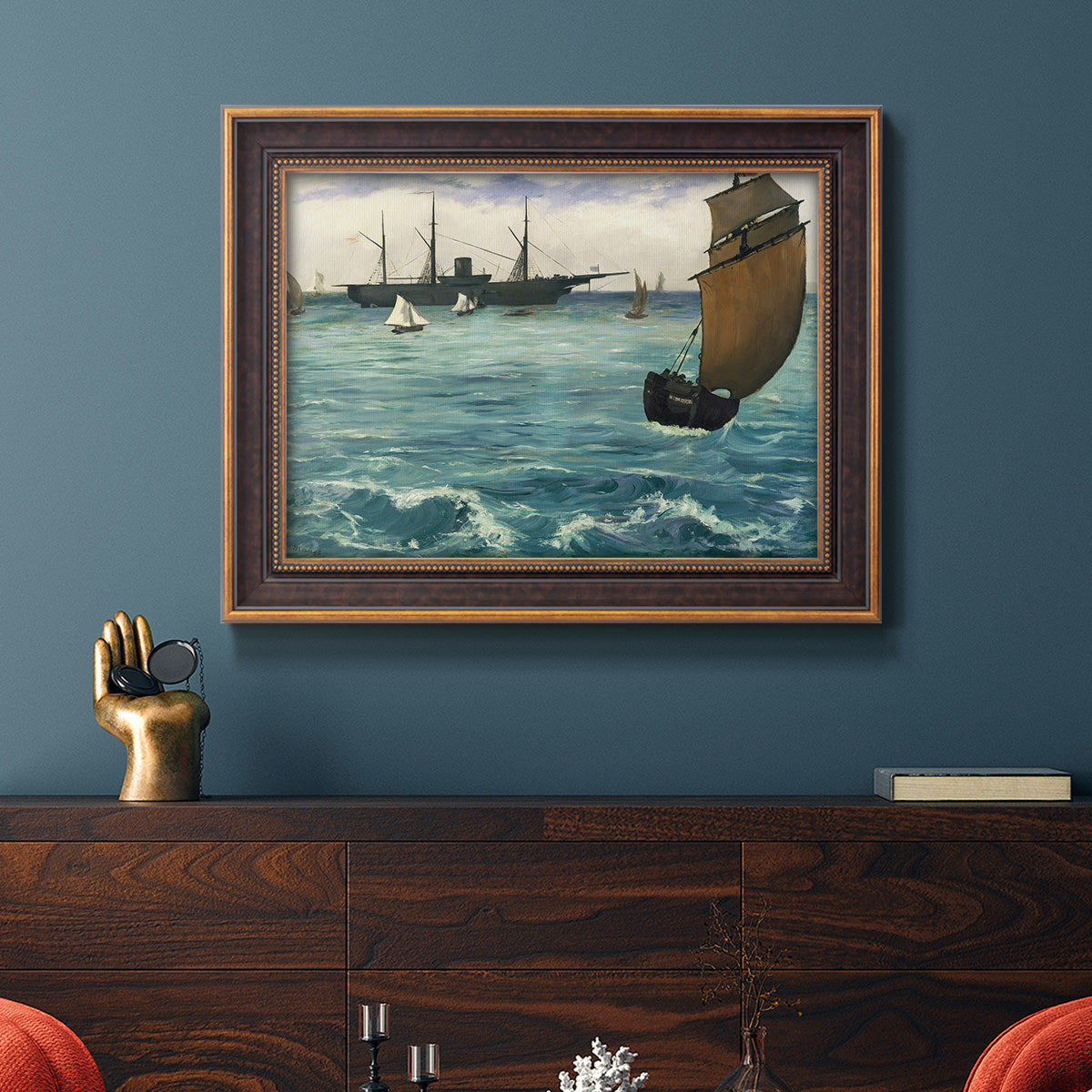 Impressionist naval seascape with the Kearsarge by Édouard Manet in an ornate bronzed mahogany wood frame displayed in a dark-toned interior setting.