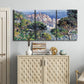 Three-panel canvas wall art featuring coastal hillside overlooking monaco, displayed above a cabinet in an entryway.