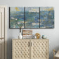 Three-panel canvas wall art featuring sparkling abstract sea surface, displayed above a cabinet in an entryway.