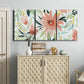 Three-panel canvas wall art featuring tropical botanical collage, displayed above a cabinet in an entryway.