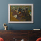 Impressionist cabaret interior scene by Henri de Toulouse-Lautrec in an ornate weathered white frame displayed in a dark-toned interior setting.
