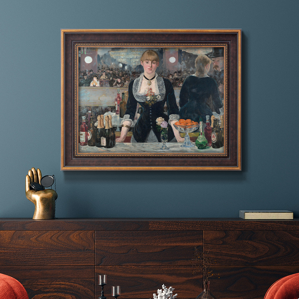 Iconic impressionist café bar scene by Édouard Manet in an ornate bronzed mahogany wood frame displayed in a dark-toned interior setting.