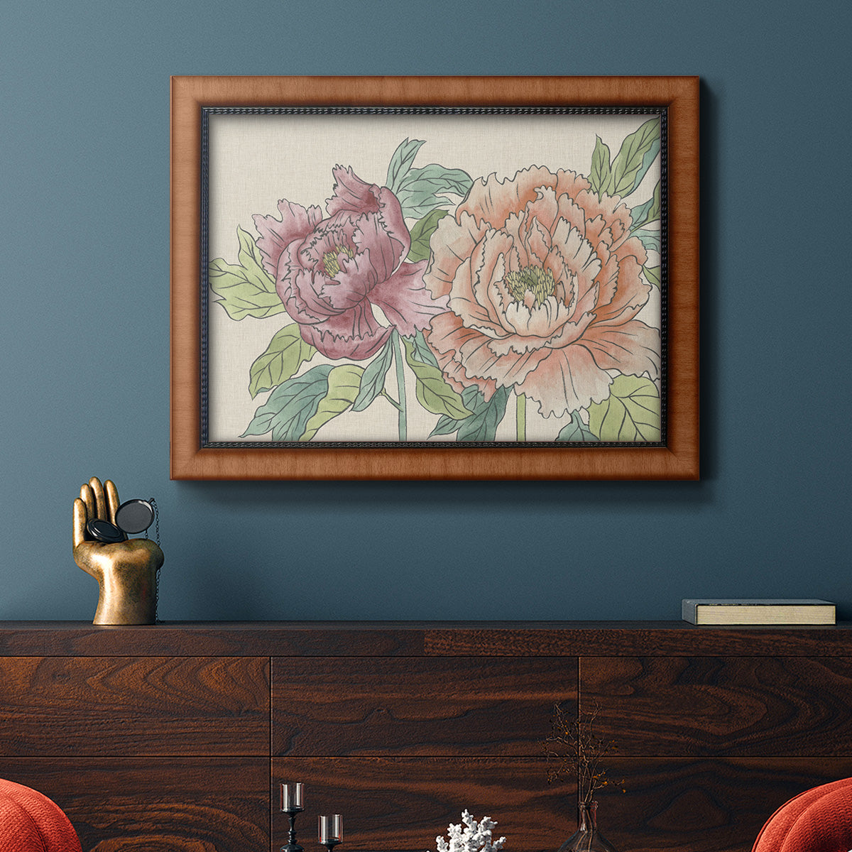 Modern peony floral drawing in an ornate vintage burl wood frame displayed in a dark-toned interior setting.