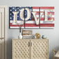 Three-panel canvas wall art featuring patriotic rustic typography art, displayed above a cabinet in an entryway.