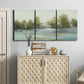 Three-panel canvas wall art featuring calming scenic landscape view, displayed above a cabinet in an entryway.