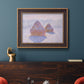 Impressionist winter haystack scene with sunlight by Claude Monet in an ornate bronzed mahogany wood frame displayed in a dark-toned interior setting.