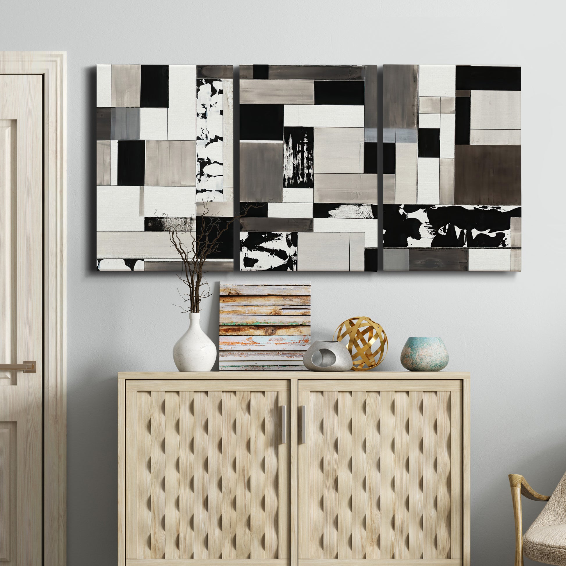 Three-panel canvas wall art featuring rectangular mid century geometric abstraction, displayed above a cabinet in an entryway.