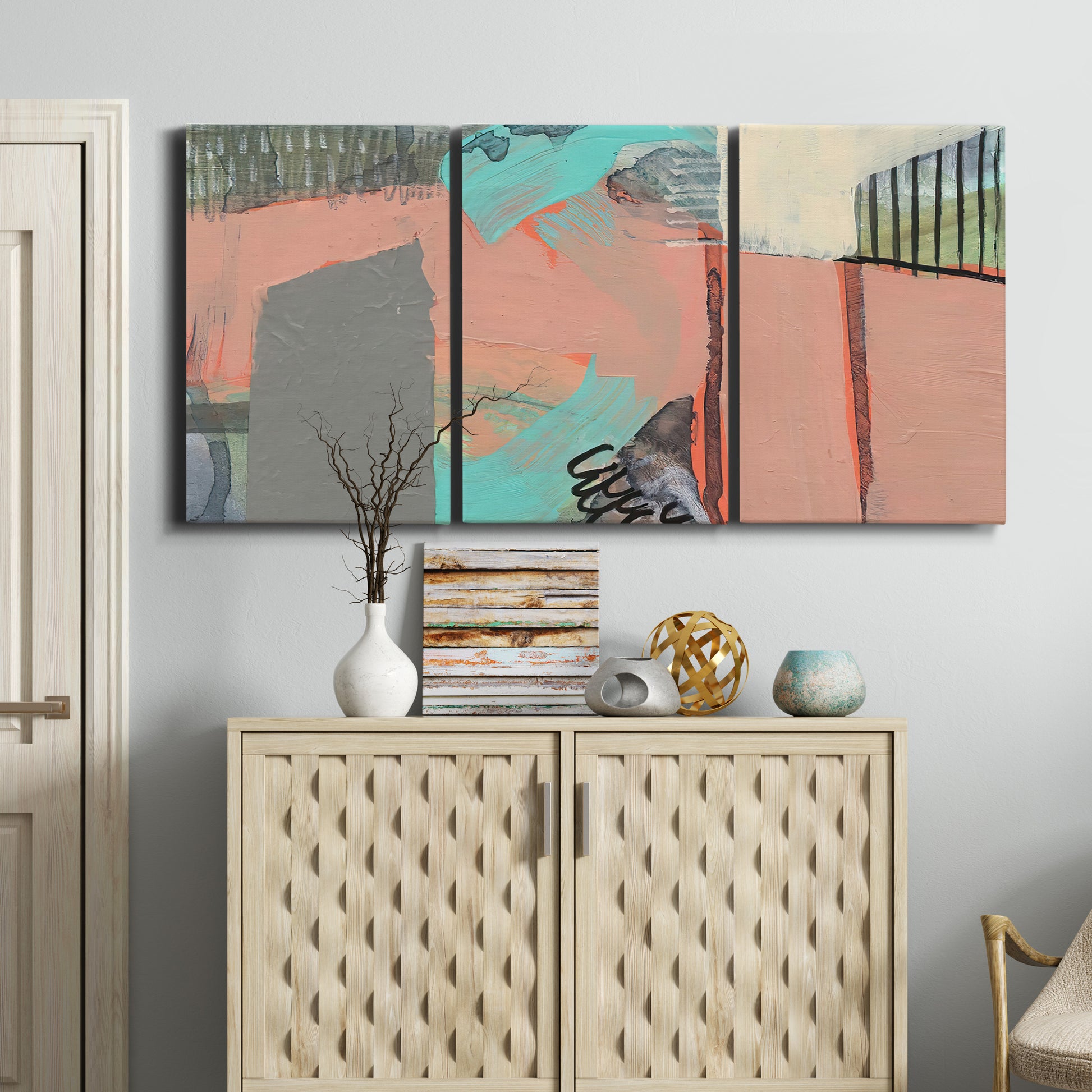 Three-panel canvas wall art featuring layered mid century abstract pathways, displayed above a cabinet in an entryway.