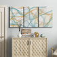 Three-panel canvas wall art featuring flowing abstract curves and wave patterns, displayed above a cabinet in an entryway.