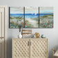 Three-panel canvas wall art featuring lush coastal garden landscape, displayed above a cabinet in an entryway.
