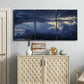 Three-panel canvas wall art featuring hot air balloons rising at dawn, displayed above a cabinet in an entryway.
