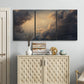 Three-panel canvas wall art featuring surreal floating figures above landscape, displayed above a cabinet in an entryway.