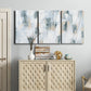 Three-panel canvas wall art featuring industrial textured abstract hatch patterns, displayed above a cabinet in an entryway.