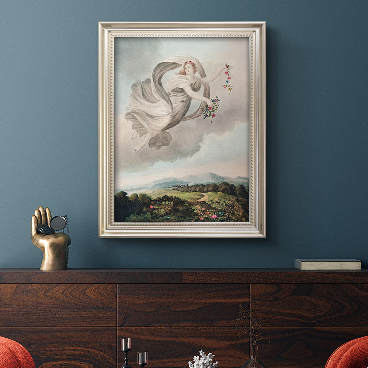 Classical allegorical depiction of the goddess Flora by Robert John Thornton in an ornate champagne frame displayed in a dark-toned interior setting.