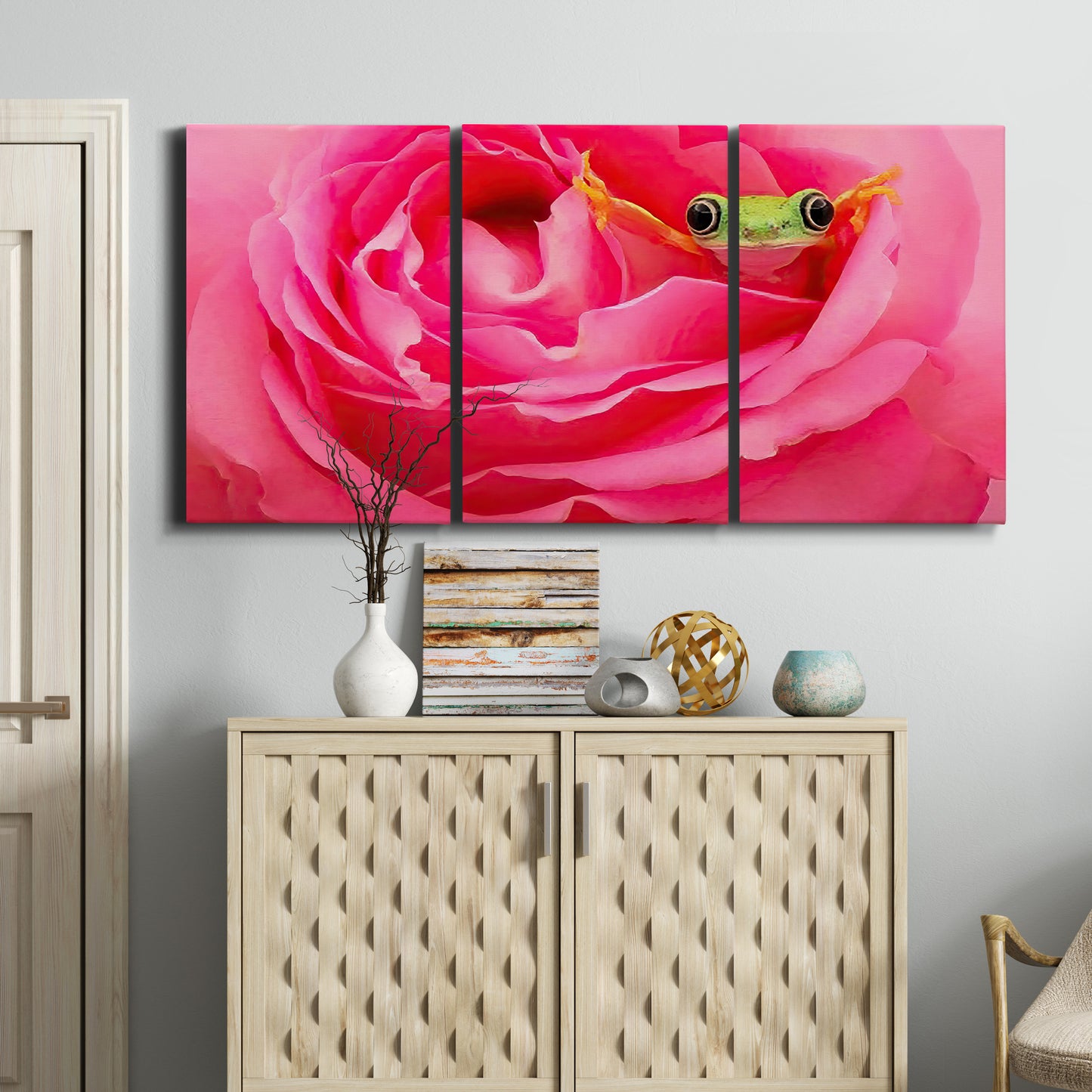 Three-panel canvas wall art featuring animal photography with floral elements, displayed above a cabinet in an entryway.