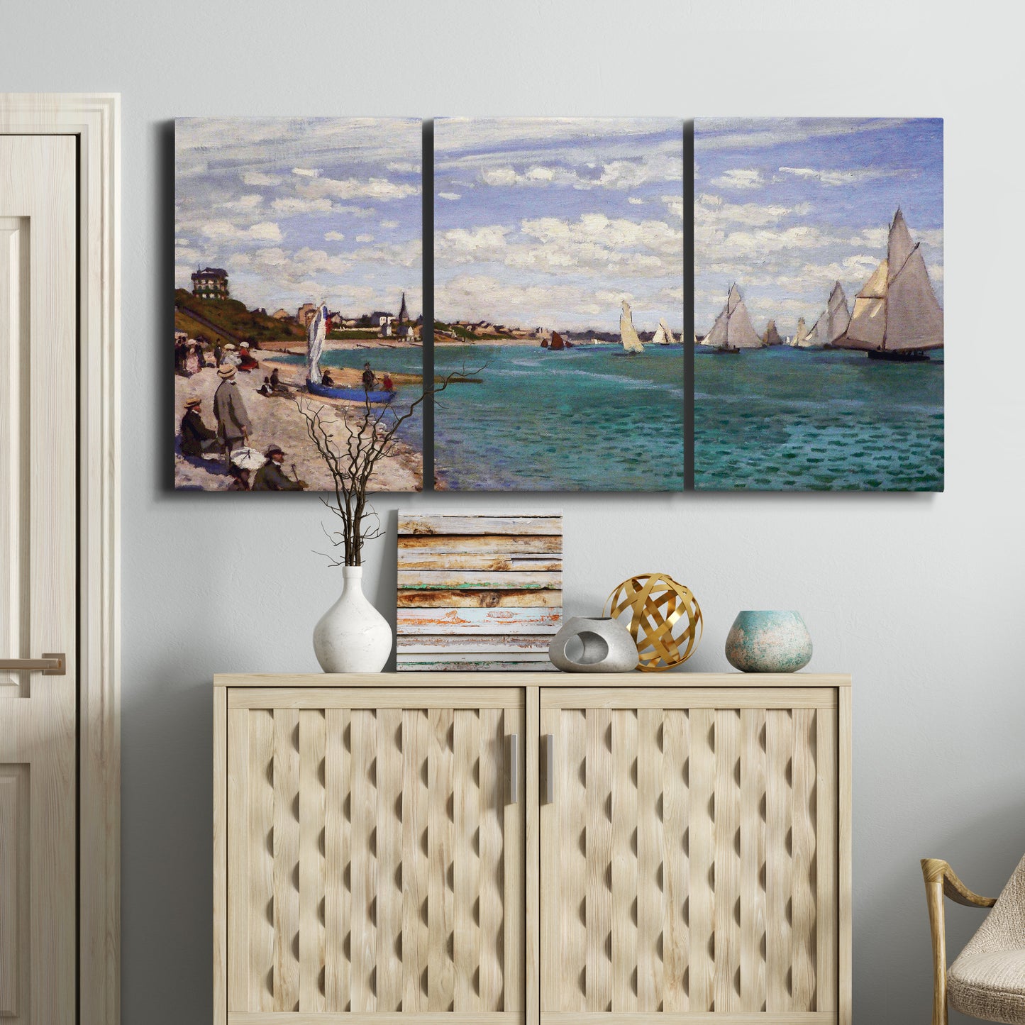 Three-panel canvas wall art featuring river basin with boats, displayed above a cabinet in an entryway.