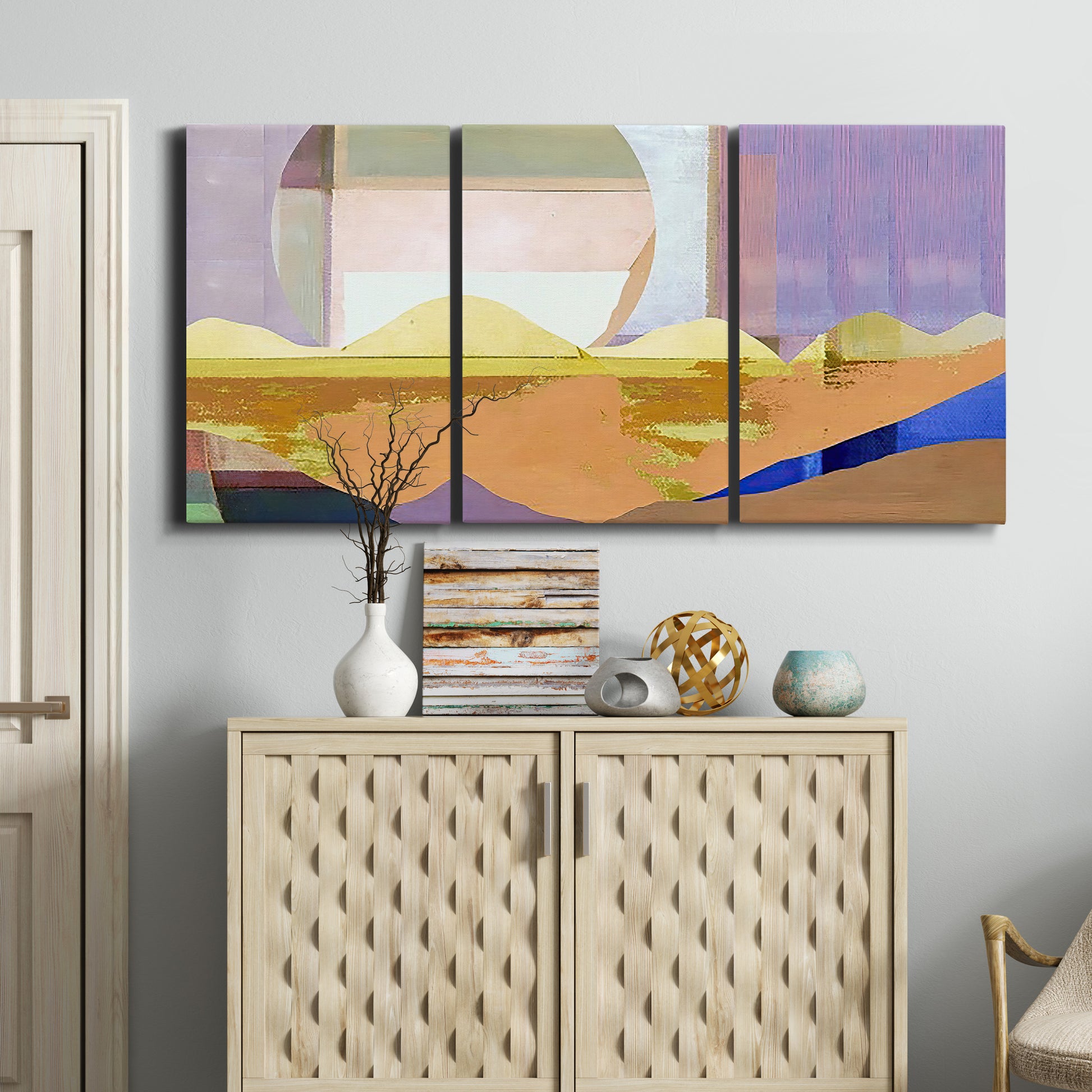 Three-panel canvas wall art featuring mid century geometric pink abstraction, displayed above a cabinet in an entryway.