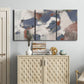 Three-panel canvas wall art featuring cool blue abstract layered composition, displayed above a cabinet in an entryway.