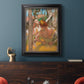 Impressionist ballet dancer composition by Edgar Degas in an ornate black frame with gilded inner detail displayed in a dark-toned interior setting.