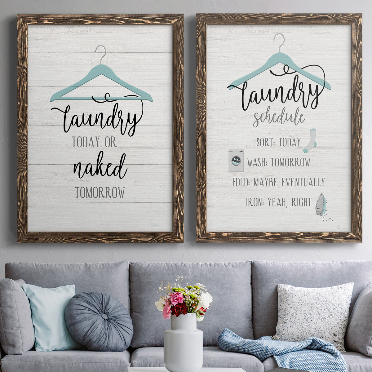 Set of two walnut barnwood framed canvas prints depicting paired rustic typographic wall art with hand-lettered phrases, socks hangers and laundry symbols on linen texture above a sofa in a contemporary living room.