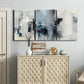 Three-panel canvas wall art featuring cool abstract winter color wash, displayed above a cabinet in an entryway.