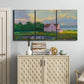 Three-panel canvas wall art featuring farmhouse near coastline landscape, displayed above a cabinet in an entryway.