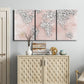 Three-panel canvas wall art featuring stylized pink cheetah world map, displayed above a cabinet in an entryway.