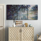 Three-panel canvas wall art featuring misty river scene in morning light, displayed above a cabinet in an entryway.