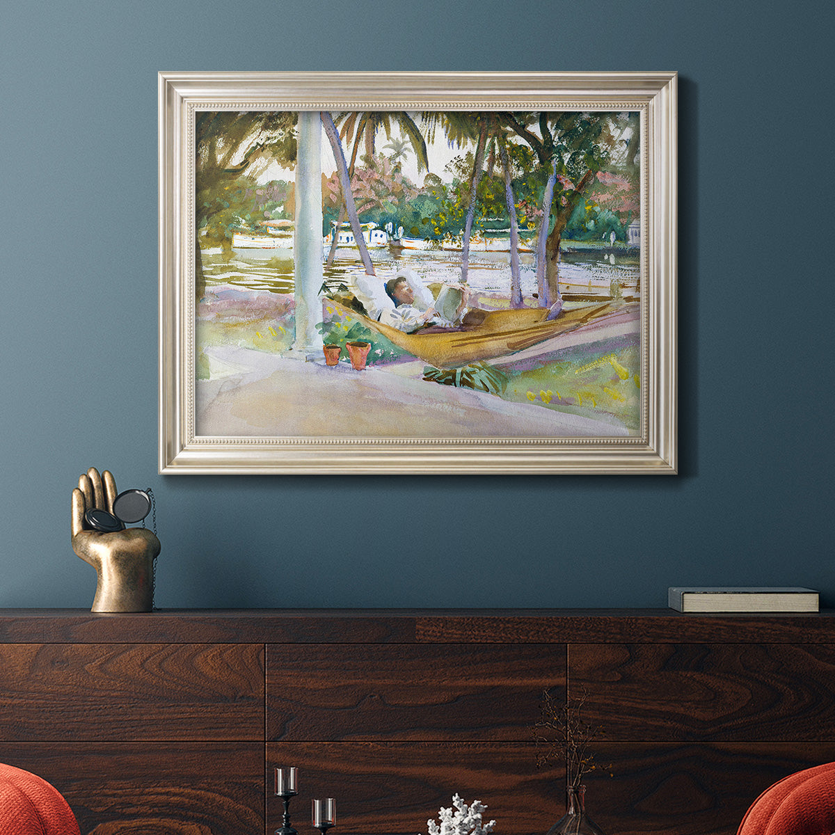 Impressionist leisure portrait scene by John Singer Sargent in an ornate champagne frame displayed in a dark-toned interior setting.