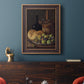 Realist still life with figs and bread by Luis Meléndez in an ornate bronzed mahogany wood frame displayed in a dark-toned interior setting.