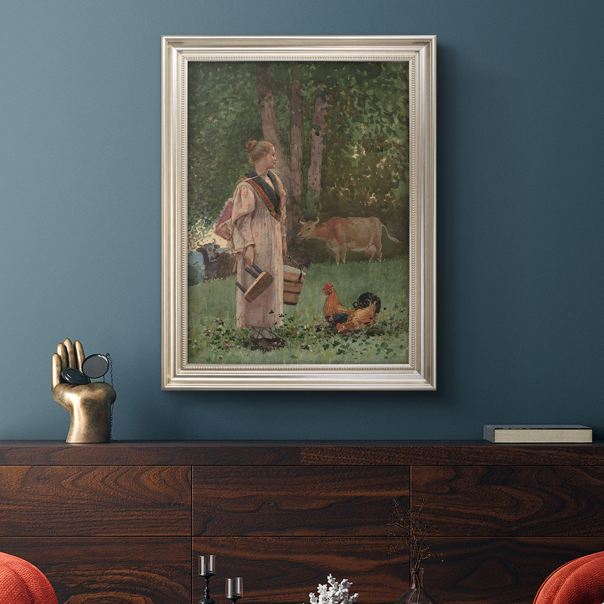 Realist genre scene of a milkmaid by Winslow Homer in an ornate champagne frame displayed in a dark-toned interior setting.