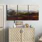 Three-panel canvas wall art featuring rustic abstract landscape exploration, displayed above a cabinet in an entryway.