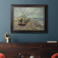 Impressionist coastal fishing boats scene by Vincent van Gogh in an ornate black frame with gilded inner detail displayed in a dark-toned interior setting.