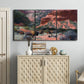 Three-panel canvas wall art featuring rugged canyon landscape with wildlife, displayed above a cabinet in an entryway.