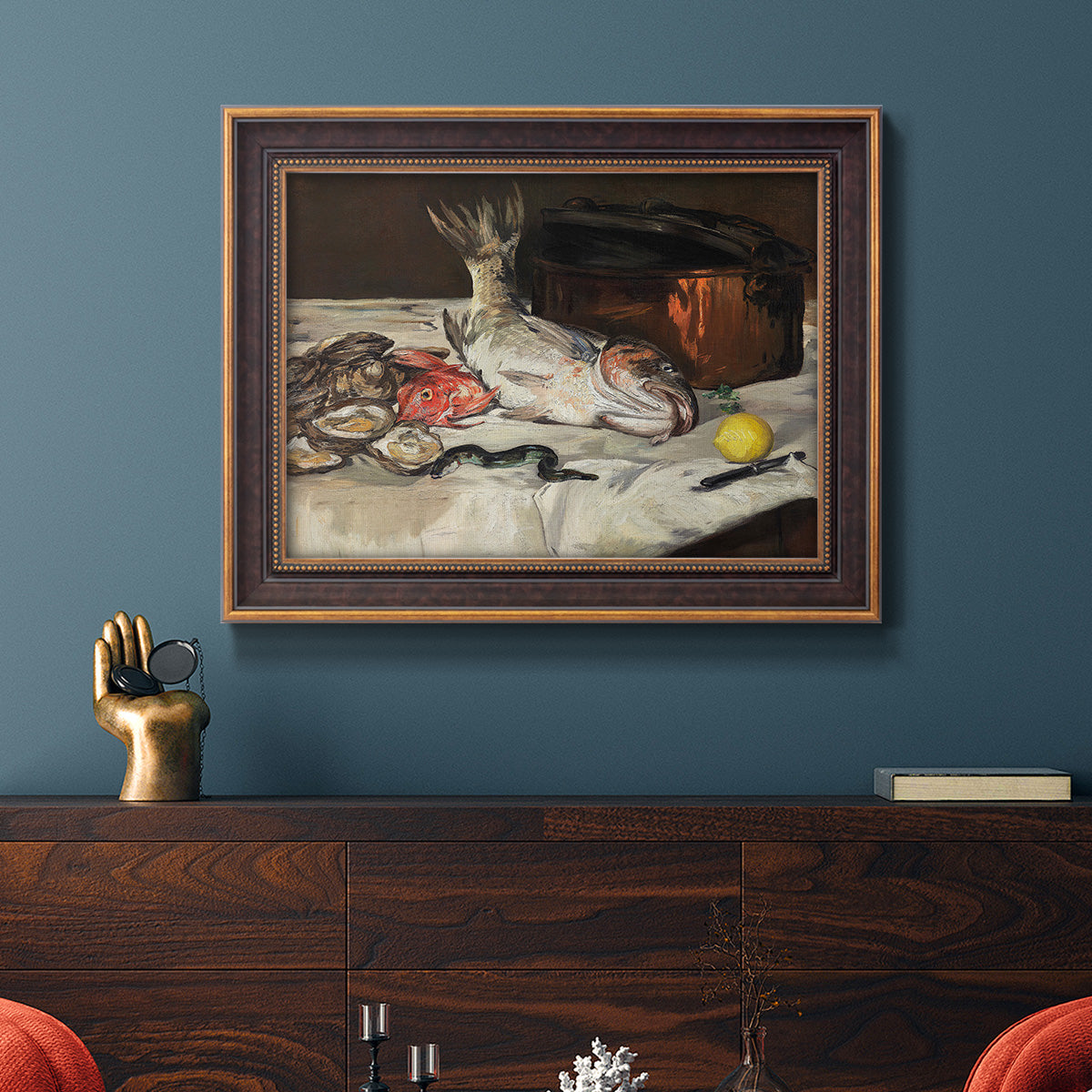 Impressionist still life painting of fish by Édouard Manet in an ornate bronzed mahogany wood frame displayed in a dark-toned interior setting.