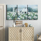 Three-panel canvas wall art featuring pastoral farmland with open fields, displayed above a cabinet in an entryway.