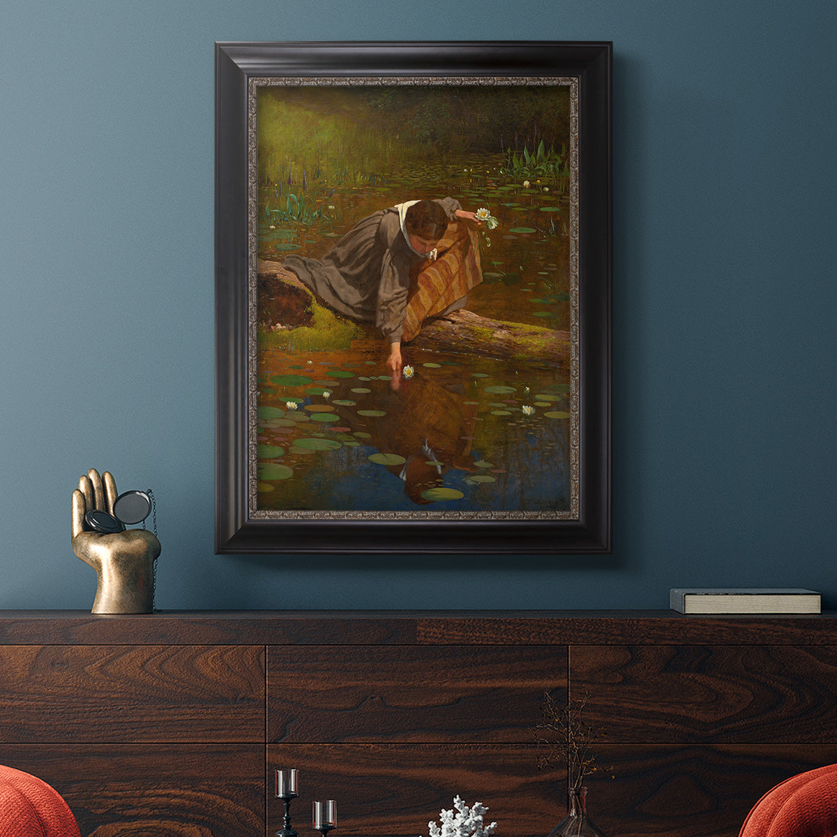 Realist genre painting of figures gathering lilies by Eastman Johnson in an ornate black frame with gilded inner detail displayed in a dark-toned interior setting.