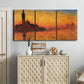 Three-panel canvas wall art featuring Venetian church at sunset, displayed above a cabinet in an entryway.