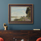 Impressionist river scene with red boats by Claude Monet in an ornate bronzed mahogany wood frame displayed in a dark-toned interior setting.