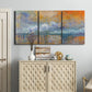 Three-panel canvas wall art featuring bridge shrouded in fog and smoke, displayed above a cabinet in an entryway.