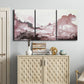 Three-panel canvas wall art featuring soft pink abstract scenic layers, displayed above a cabinet in an entryway.