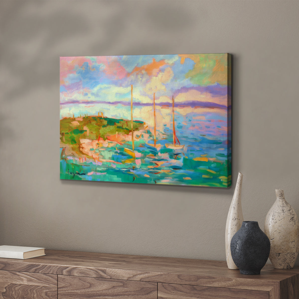 Colorful seascape with boats and vibrant skies over a coastal landscape in late afternoon light