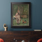 Realist genre scene of a milkmaid by Winslow Homer in an ornate black frame with gilded inner detail displayed in a dark-toned interior setting.