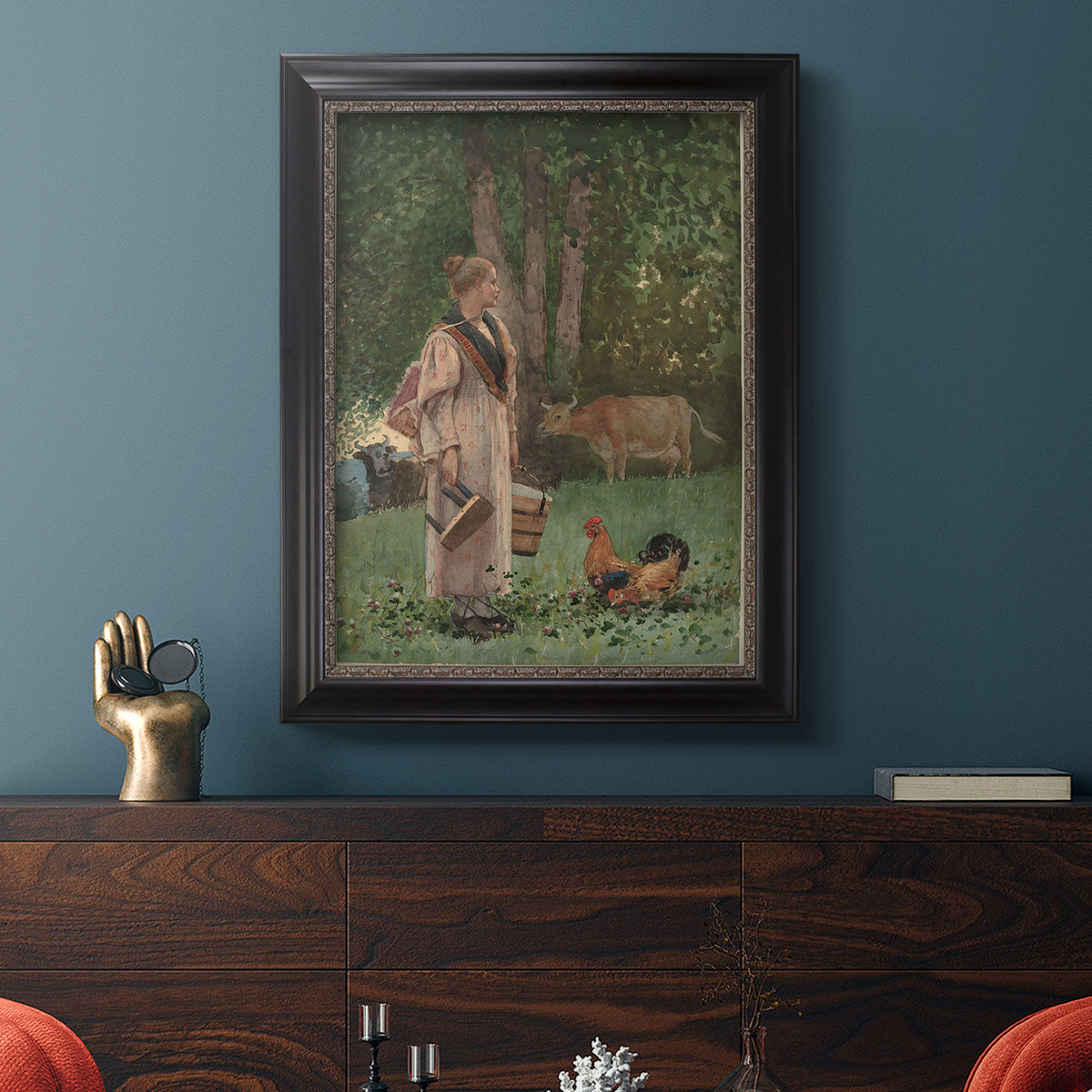 Realist genre scene of a milkmaid by Winslow Homer in an ornate black frame with gilded inner detail displayed in a dark-toned interior setting.