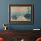Impressionist winter river sunset scene by Claude Monet in an ornate bronzed mahogany wood frame displayed in a dark-toned interior setting.