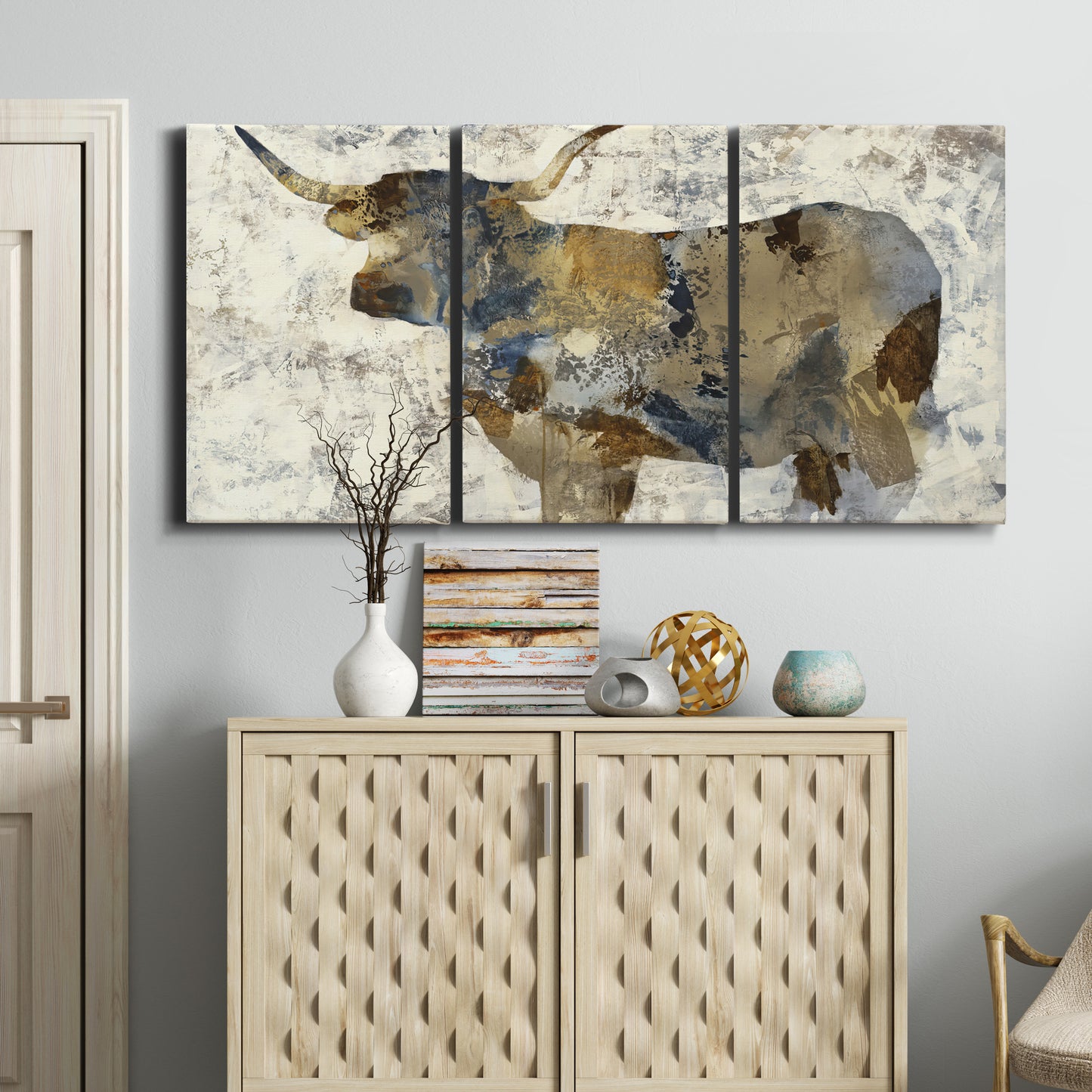 Three-panel canvas wall art featuring farm animal portrait in rustic setting, displayed above a cabinet in an entryway.